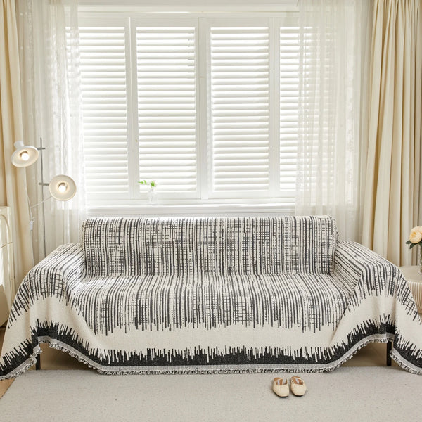 Jeté de Canapé Épais "Lignes Élégantes" – Un Style Intemporel.